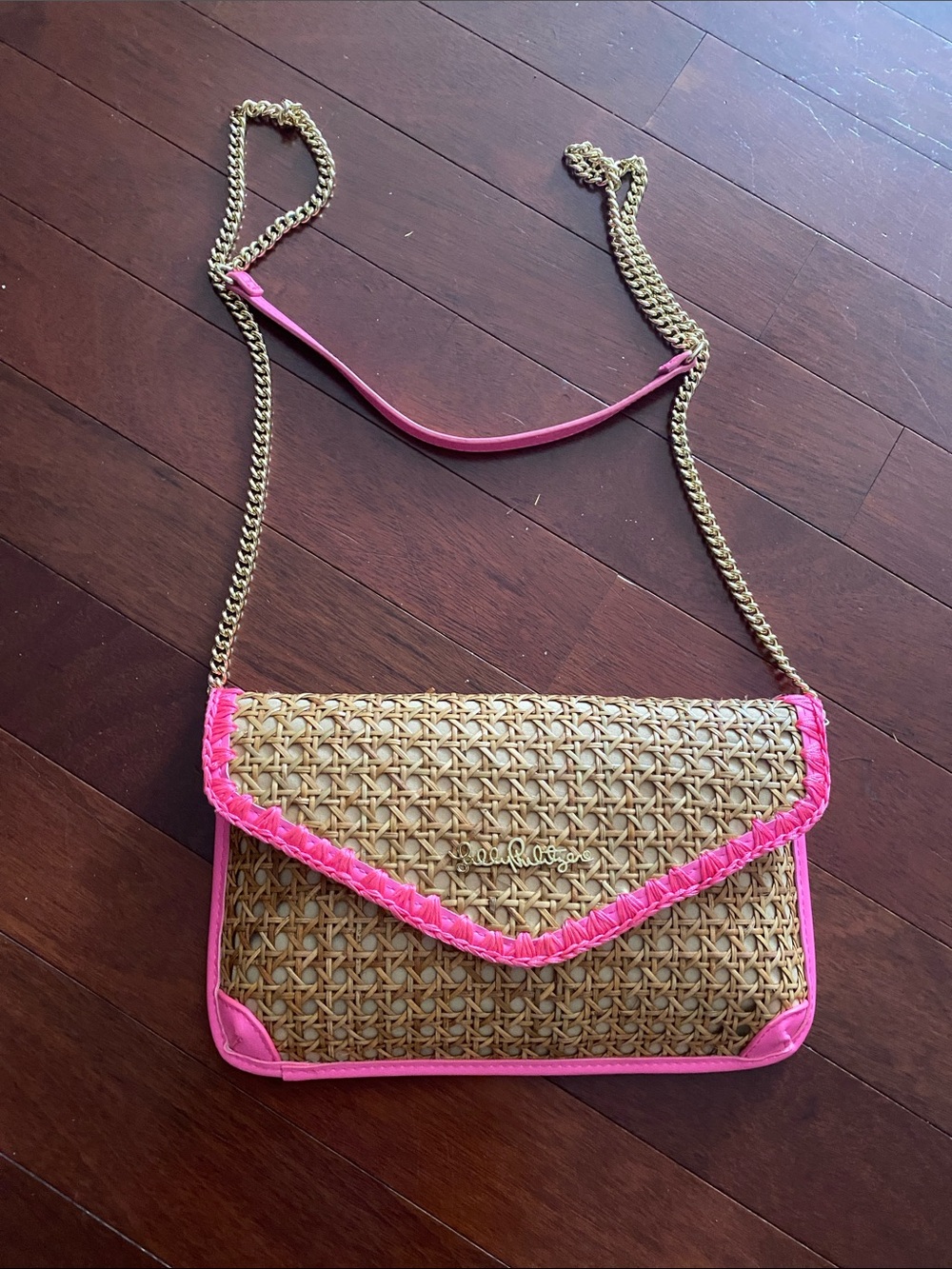Woven Straw Crossbody Bag w/ Pink Trim. Excellent condition.